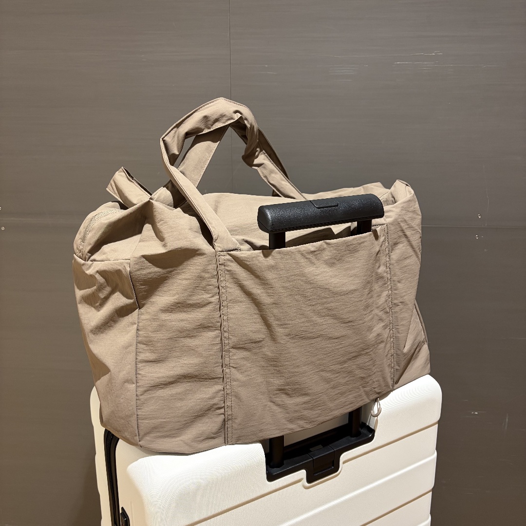 NEWoManYOKOHAMA】旅に便利な、たためるボストンバッグ｜無印良品